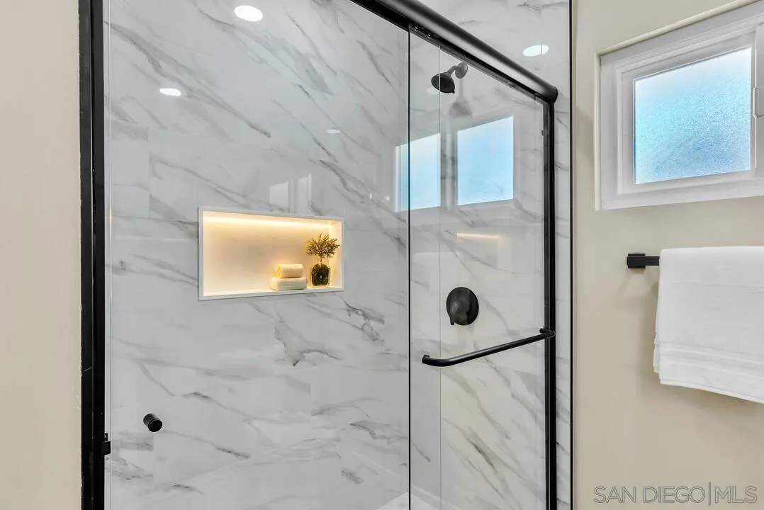 13725 Adrian Street Poway, CA 92064 - Photo 27 of 52 a bathroom with a shower