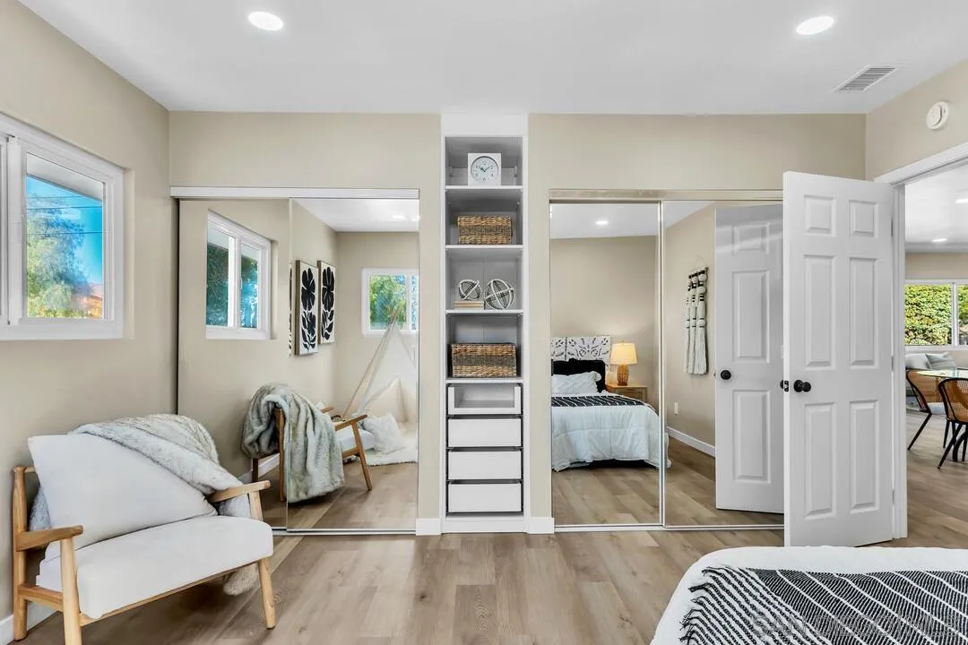 13725 Adrian Street Poway, CA 92064 - Photo 30 of 52 a bedroom with furniture and a wooden floor