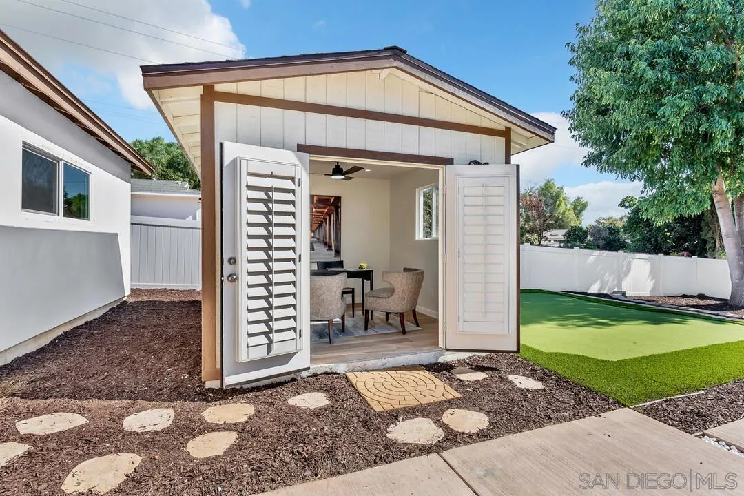 13725 Adrian Street Poway, CA 92064 - Photo 31 of 52 a front view of a house with a yard