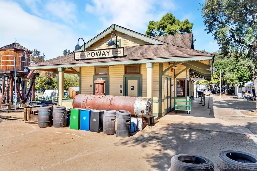 13725 Adrian Street Poway, CA 92064 - Photo 51 of 52 a front view of a building with sitting area