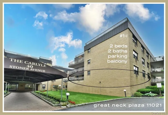 a view of a street with a building in the background