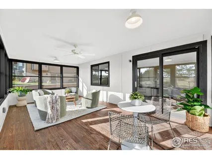 a bedroom with a bed and a night stand