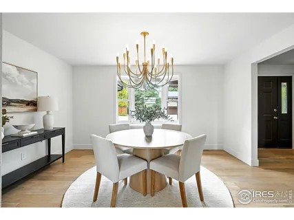 a kitchen with a sink cabinets and a window