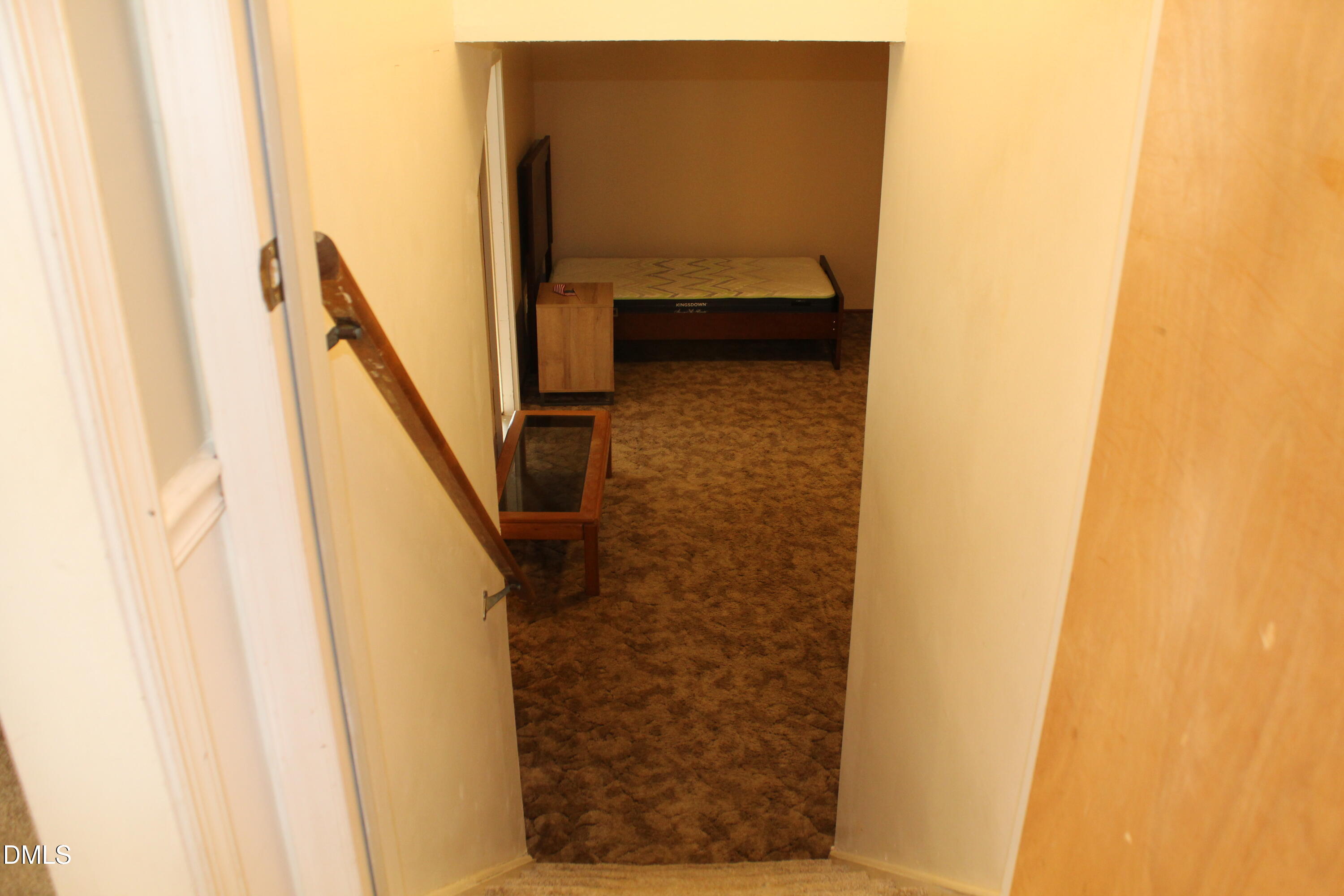 7609 Gold Mine Court Raleigh, NC 27615 - Photo 24 of 36 Stairway to Lower Level
