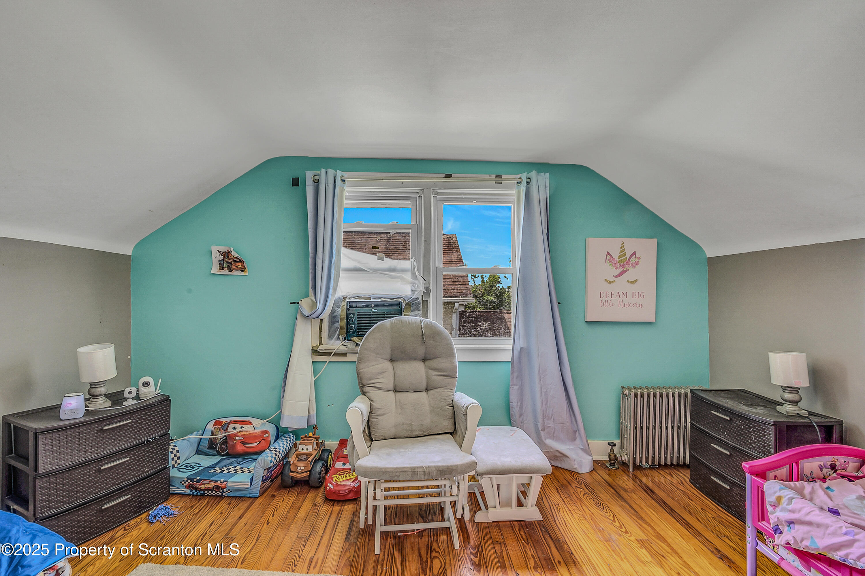 723 Chestnut Street Eynon, PA 18403 - Photo 28 of 34 a living room with furniture and a wooden floor