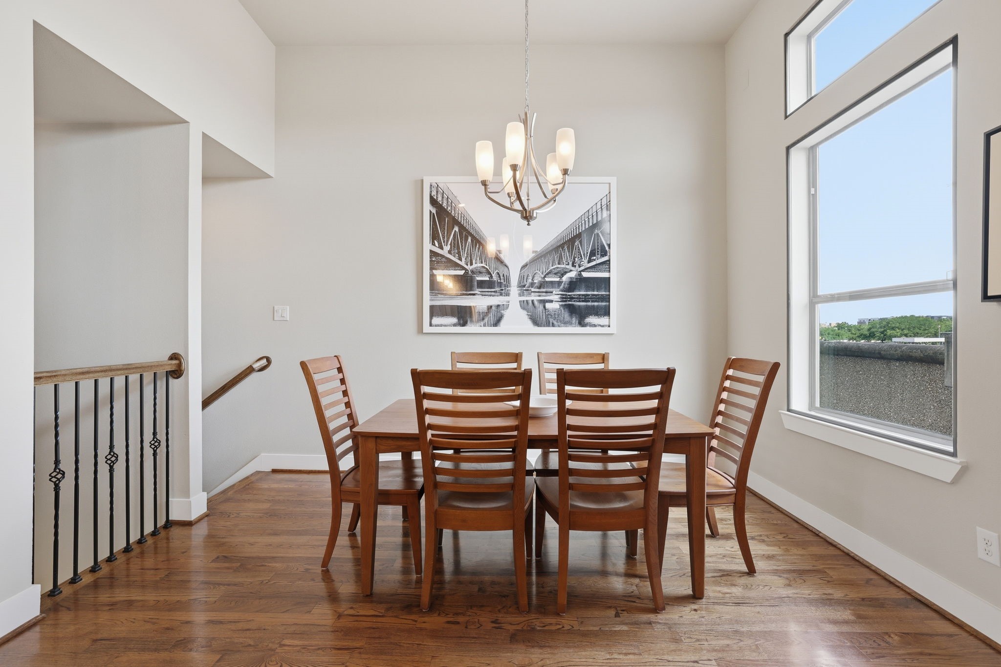 4102 Marina Street Houston, TX 77007 - Photo 7 of 32 The separate dining room seamlessly connects to the beautiful kitchen, highlighting the home’s thoughtful flow and designer fixtures.