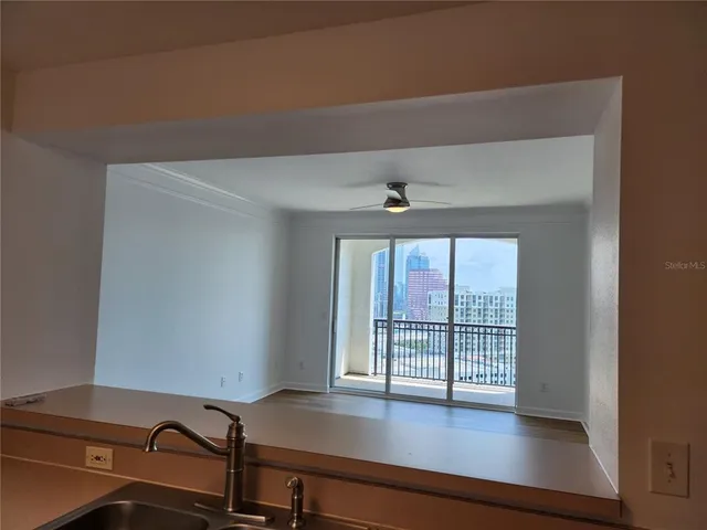 a kitchen with a sink and cabinets
