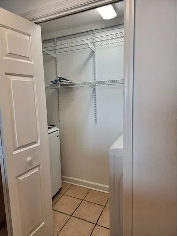 front view of building with multi story residential apartment building and stairs