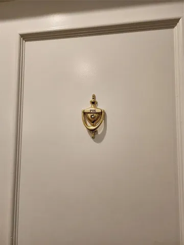 a close up of a wall with a window