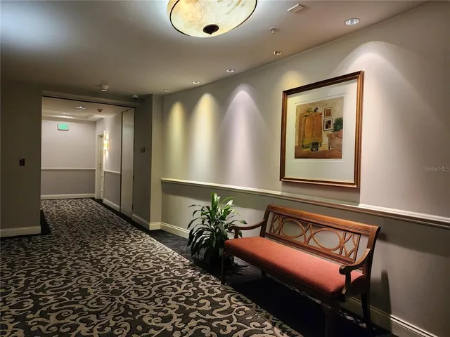 a view of a hallway with a couch