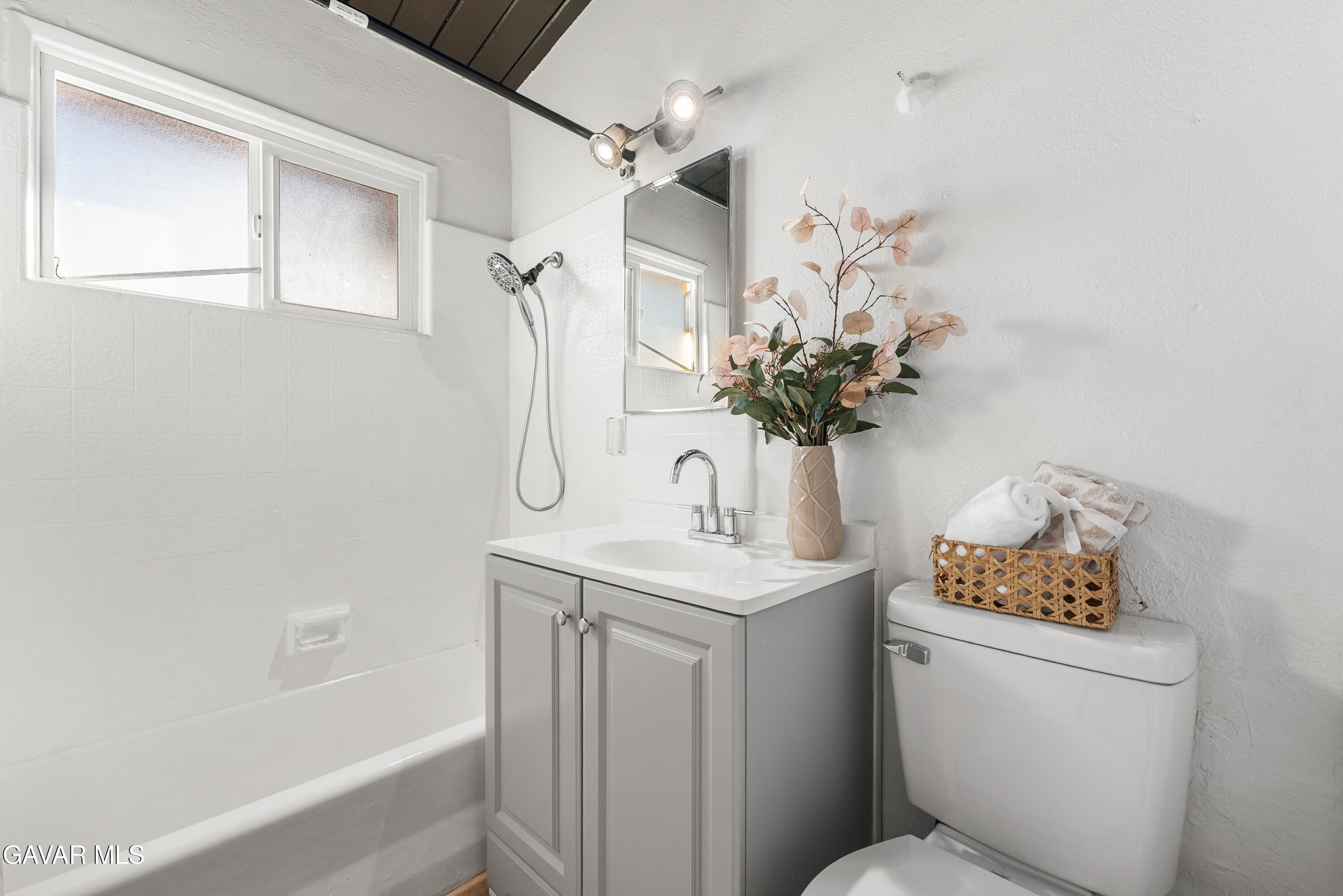 38640 Larkin Avenue Palmdale, CA 93550 - Photo 25 of 38 a bathroom with a sink toilet and shower