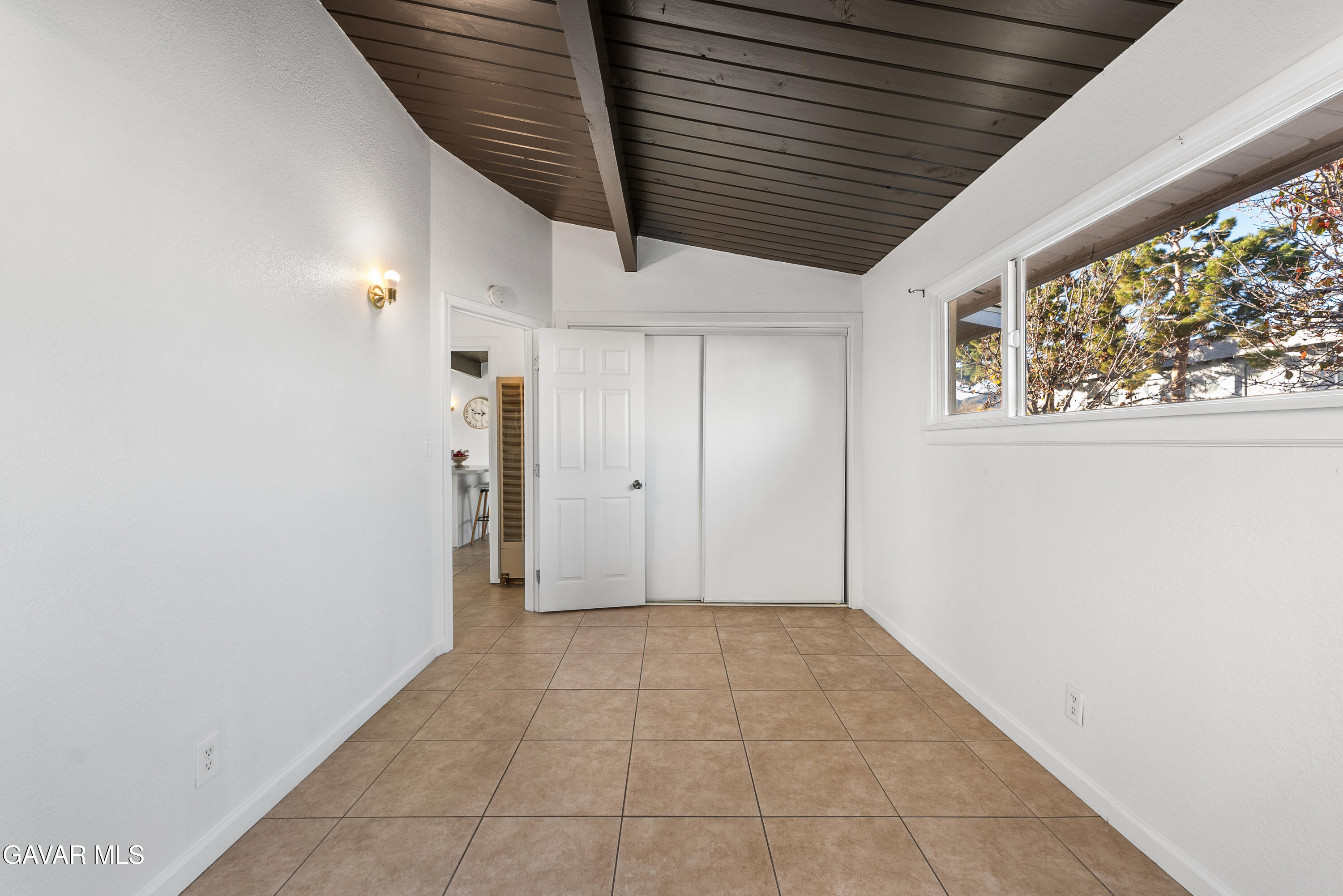 38640 Larkin Avenue Palmdale, CA 93550 - Photo 32 of 38 a view of an empty room with a window