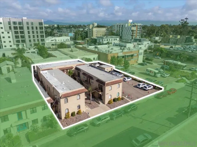 a view of a house with a yard from a terrace