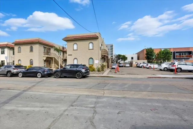 a view of car parked in front of house