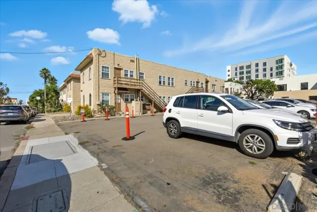 a view of a cars parked in front of a building