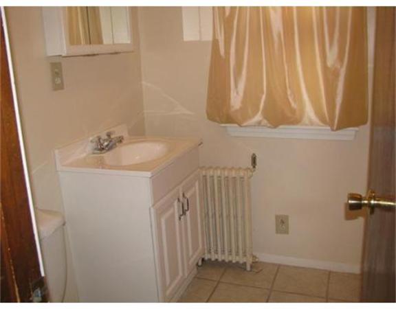 360 Main Street Springfield, MA 01105 - Photo 6 of 23 a bathroom with a sink and a mirror