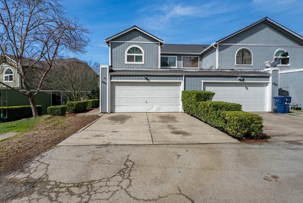 a house view with a outdoor space