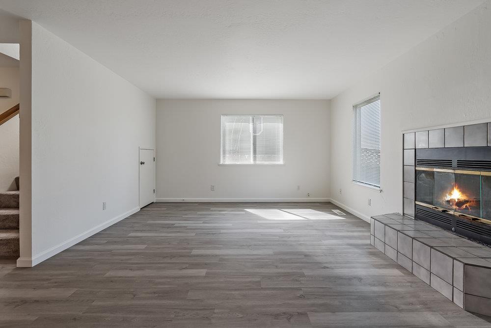 502 Winchester Drive Watsonville, CA 95076 - Photo 12 of 43 a view of empty room with window and fireplace