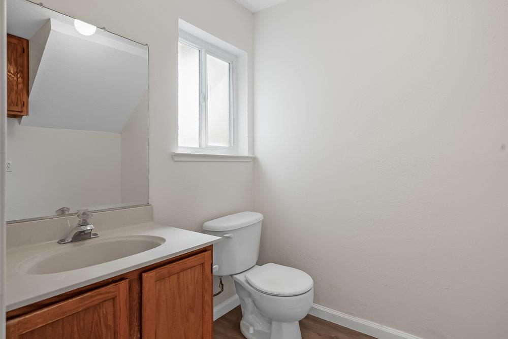 502 Winchester Drive Watsonville, CA 95076 - Photo 20 of 43 a bathroom with a sink a toilet and a mirror