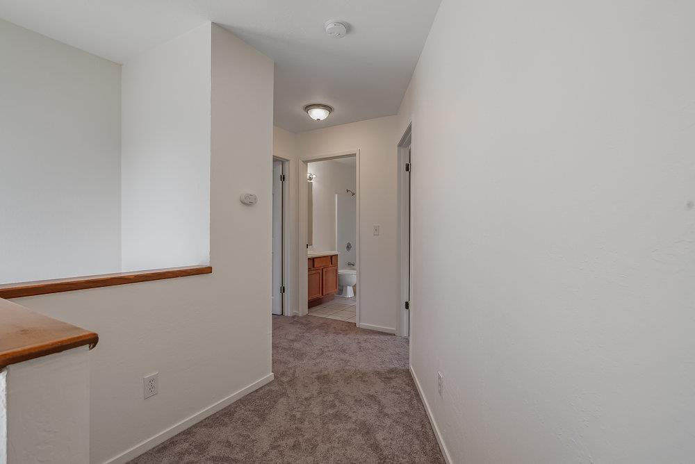 502 Winchester Drive Watsonville, CA 95076 - Photo 25 of 43 a view of hallway with closet and a white door