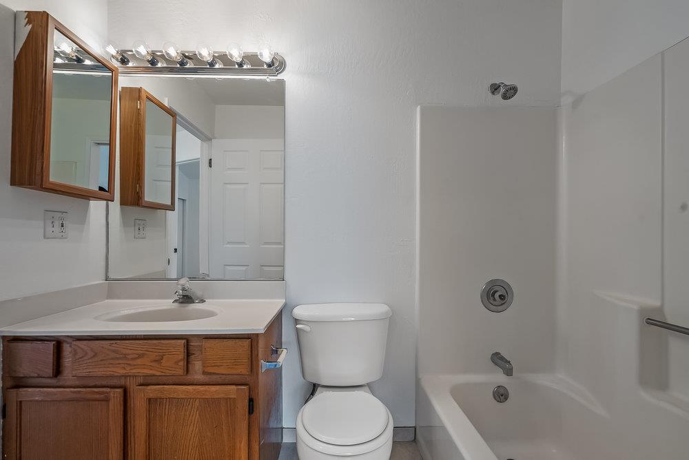 502 Winchester Drive Watsonville, CA 95076 - Photo 29 of 43 a bathroom with a sink a toilet and shower
