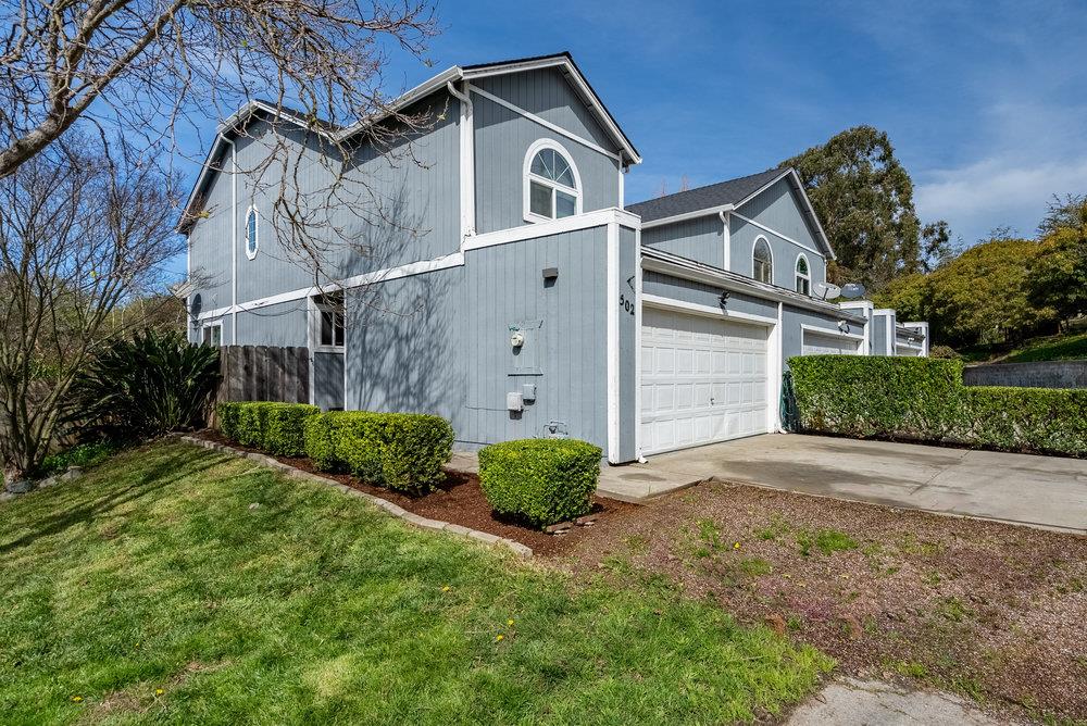 502 Winchester Drive Watsonville, CA 95076 - Photo 4 of 43 a front view of a house with a yard