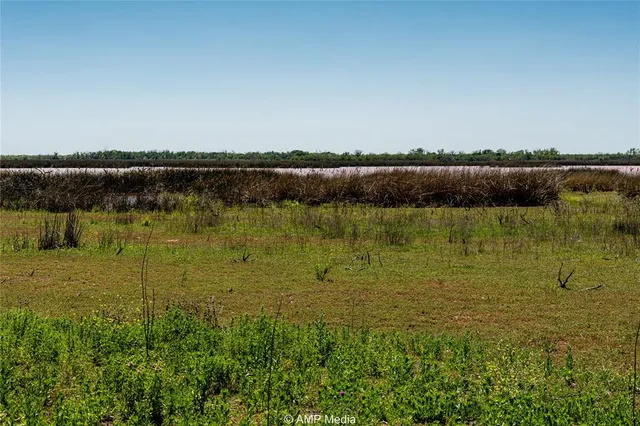 a view of a lake with a city