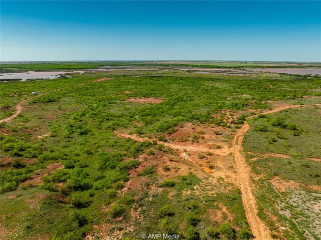 a view of yard with swimming pool