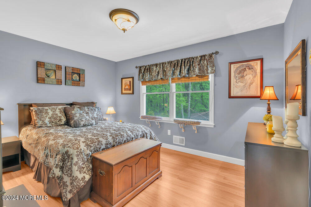 33 Butterfly Road Jackson, NJ 08527 - Photo 13 of 29 a bedroom with a bed and a window