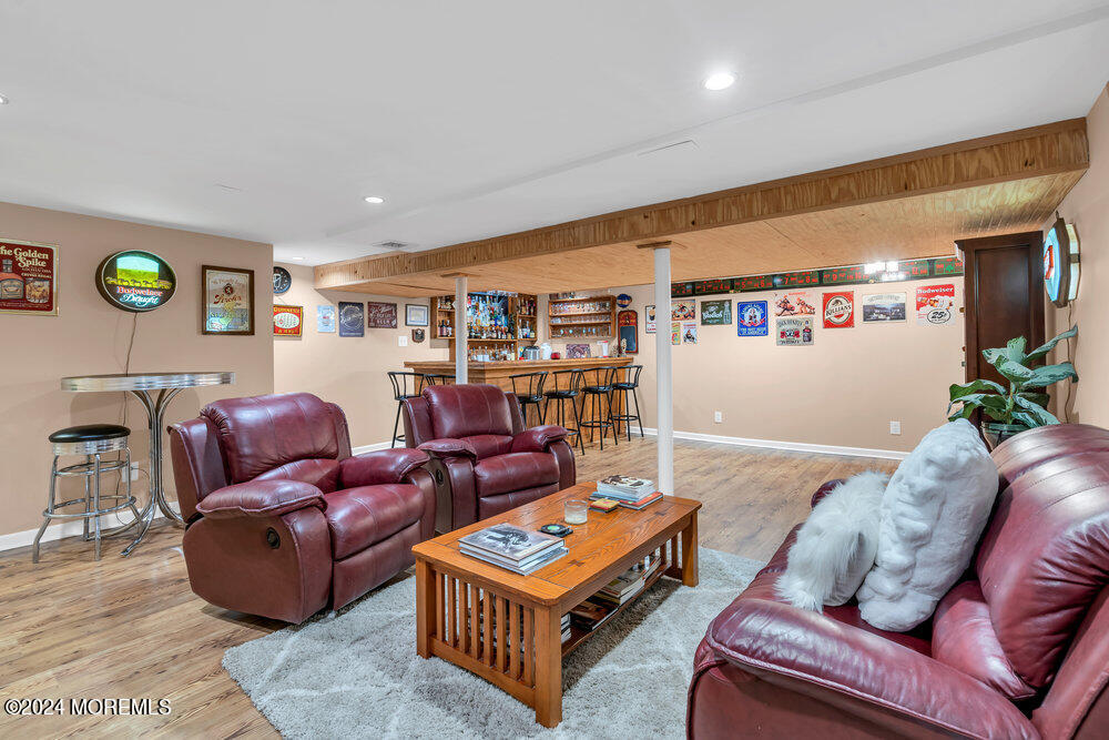 33 Butterfly Road Jackson, NJ 08527 - Photo 14 of 29 a living room with furniture and a rug
