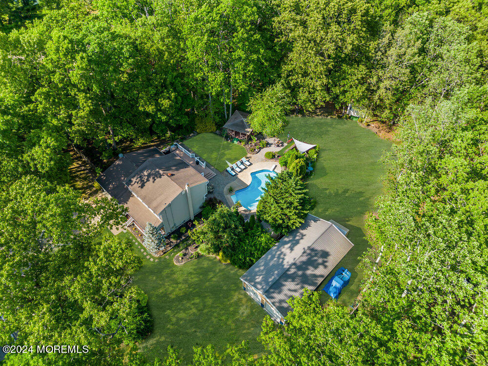 33 Butterfly Road Jackson, NJ 08527 - Photo 2 of 29 an aerial view of a house with a yard