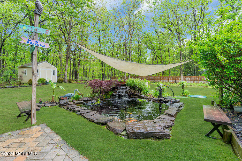 33 Butterfly Road Jackson, NJ 08527 - Photo 21 of 29 a garden view with a seating space