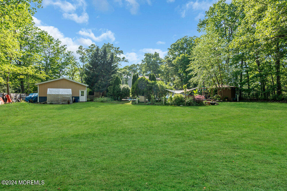 33 Butterfly Road Jackson, NJ 08527 - Photo 26 of 29 a front view of a house with garden
