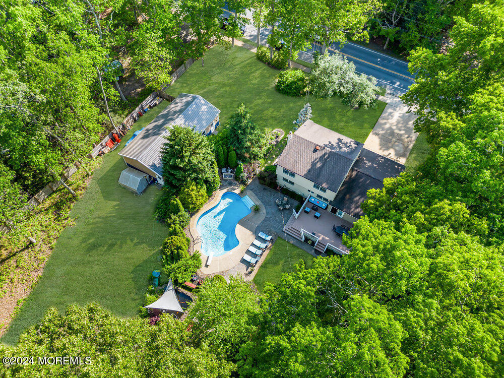 33 Butterfly Road Jackson, NJ 08527 - Photo 28 of 29 an aerial view of a house with a garden and lake view