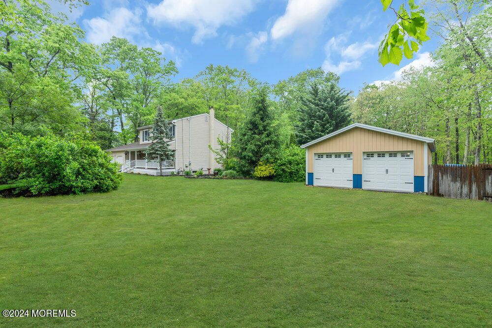 33 Butterfly Road Jackson, NJ 08527 - Photo 6 of 29 a view of an house with backyard space and garden