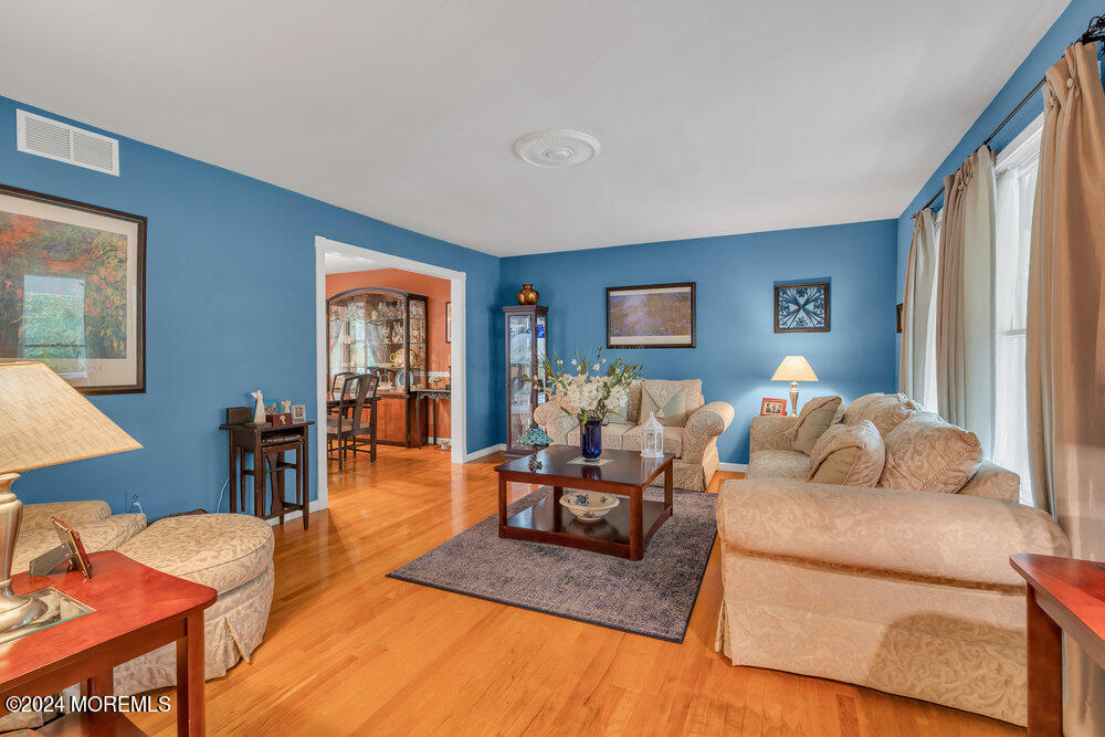 33 Butterfly Road Jackson, NJ 08527 - Photo 10 of 29 a living room with furniture and a window