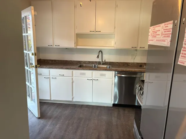 a bathroom with a shower and toilet