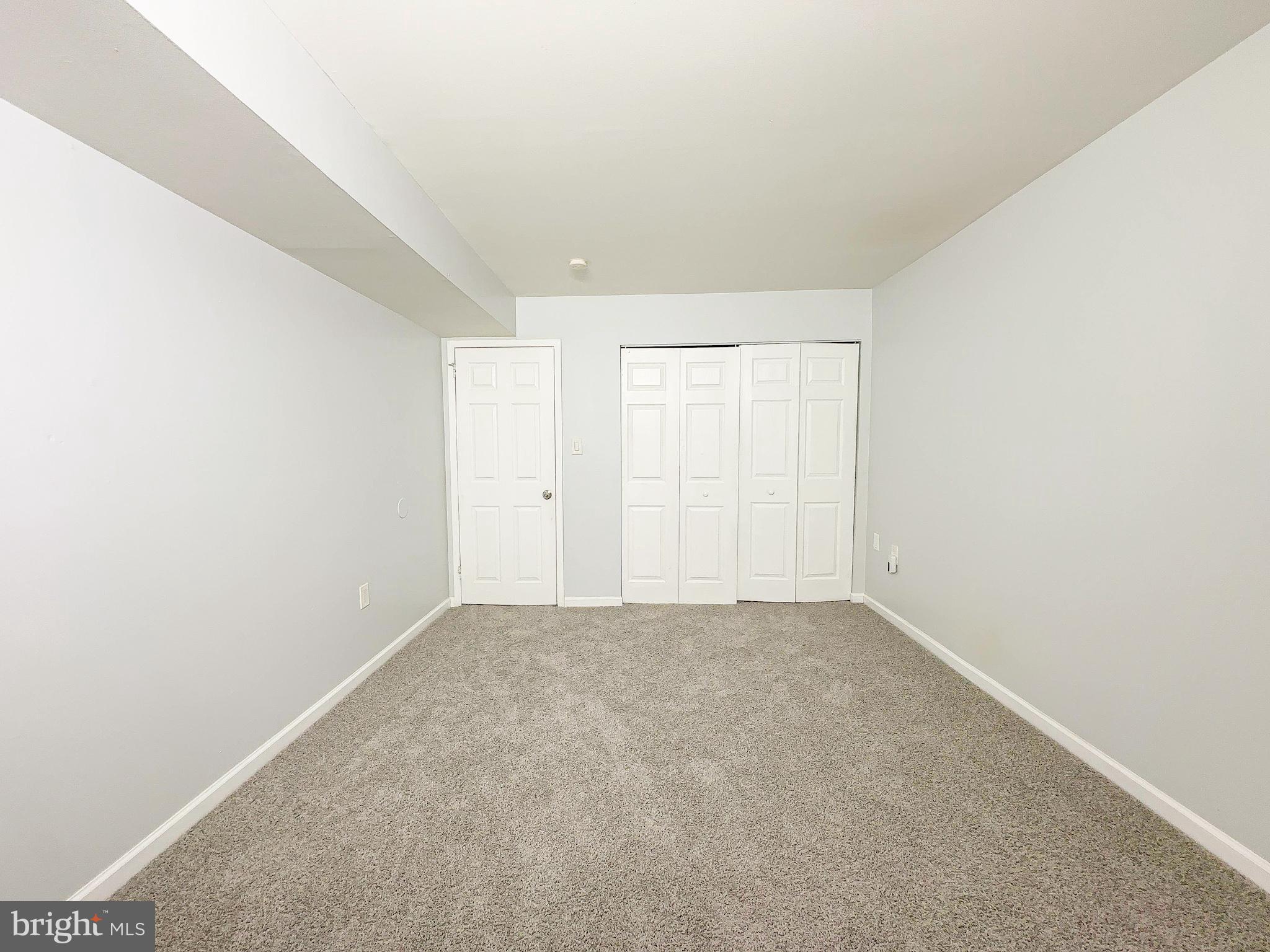 8671 Greenbelt Road, Unit 101 Greenbelt, MD 20770 - Photo 11 of 14 a view of an empty room