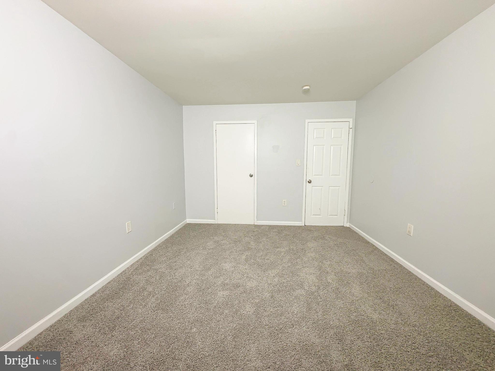 8671 Greenbelt Road, Unit 101 Greenbelt, MD 20770 - Photo 13 of 14 a view of an empty room