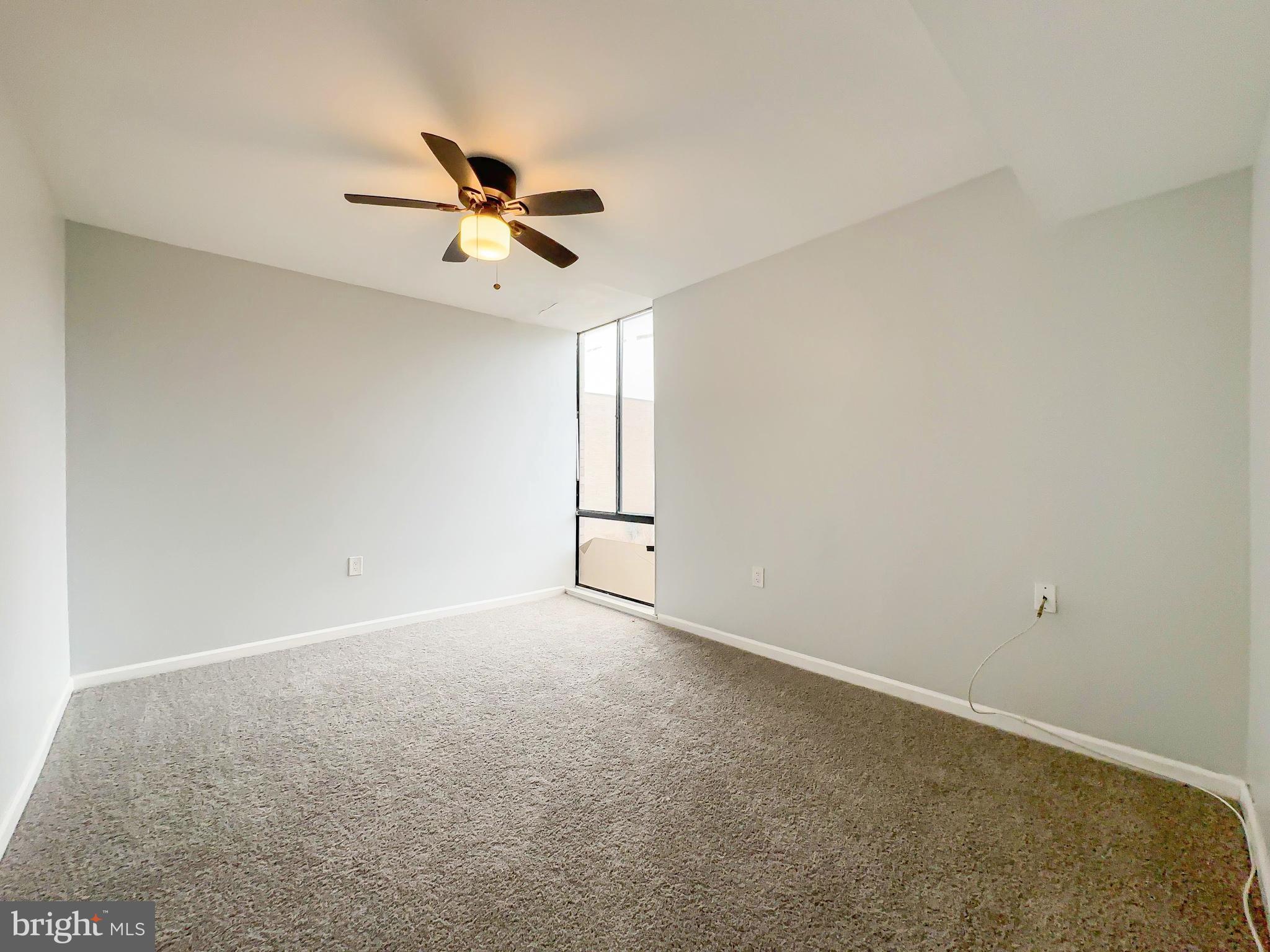 8671 Greenbelt Road, Unit 101 Greenbelt, MD 20770 - Photo 7 of 14 a view of an empty room