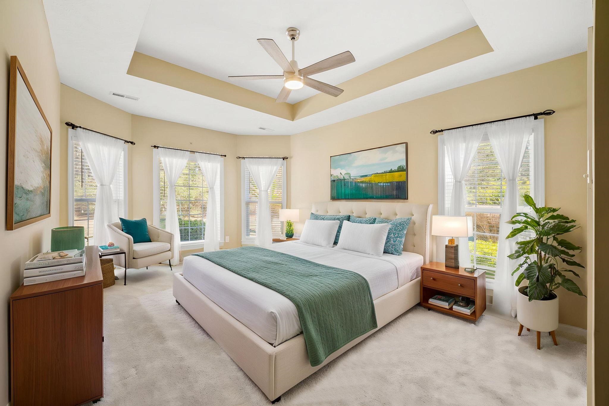 266 Laurel Bay Drive Murrells Inlet, SC 29576 - Photo 13 of 40 Primary Suite with Tray Ceiling & Bay Windows with Natural Light overlooking private backyard