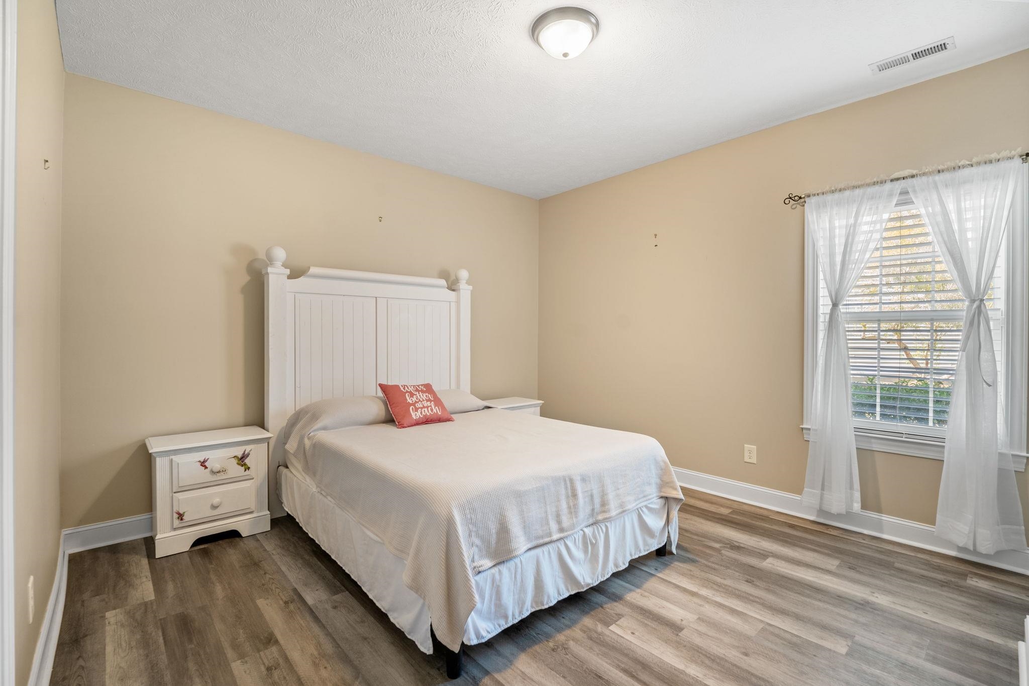 266 Laurel Bay Drive Murrells Inlet, SC 29576 - Photo 20 of 40 3rd Bedroom with Vinyl Plank flooring