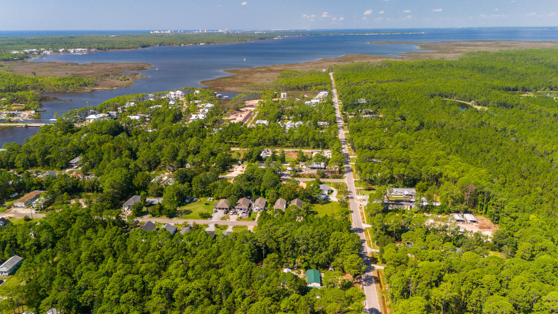 234 East Nursery Road Santa Rosa Beach, FL 32459 - Photo 2 of 4 a view of a lake with a city