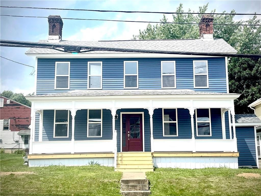 725 West Main Street Rural Valley, PA 16249 - Photo 1 of 35 a view of a house with a yard balcony