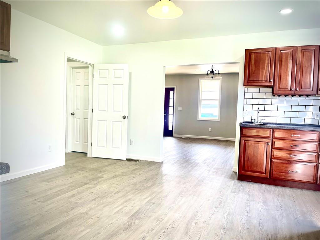 725 West Main Street Rural Valley, PA 16249 - Photo 14 of 35 a view of a room with wooden floor and cabinet