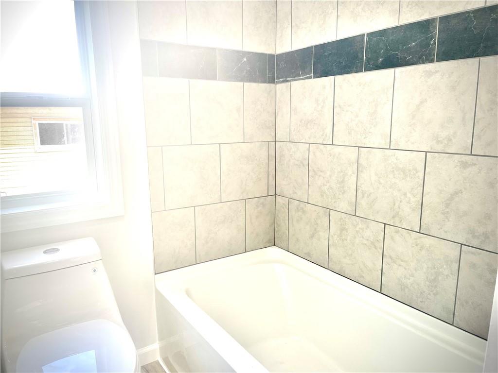 725 West Main Street Rural Valley, PA 16249 - Photo 27 of 35 a bathroom with a bathtub and a toilet