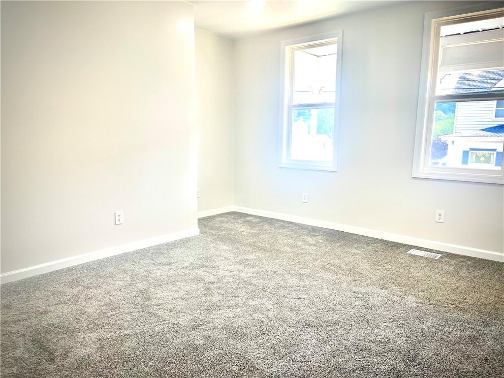 725 West Main Street Rural Valley, PA 16249 - Photo 33 of 35 an empty room with a window