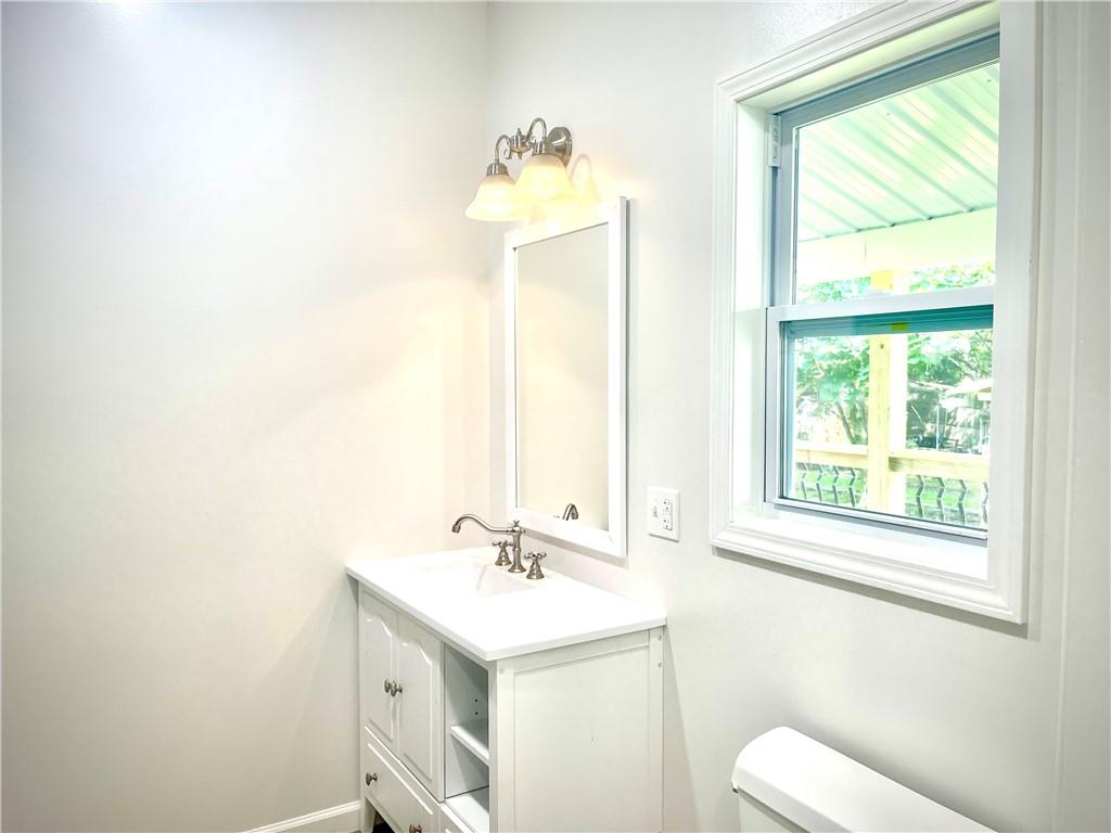 725 West Main Street Rural Valley, PA 16249 - Photo 35 of 35 a bathroom with a sink and a mirror