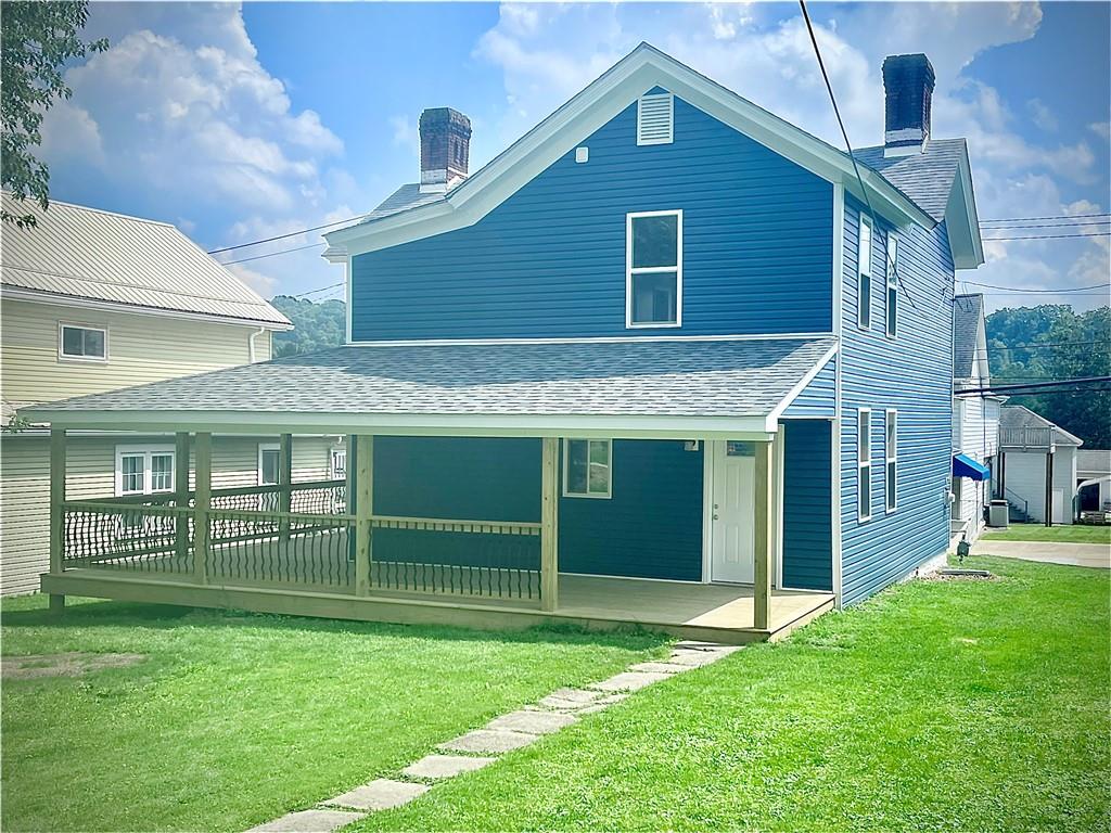 725 West Main Street Rural Valley, PA 16249 - Photo 5 of 35 a view of a house with a yard