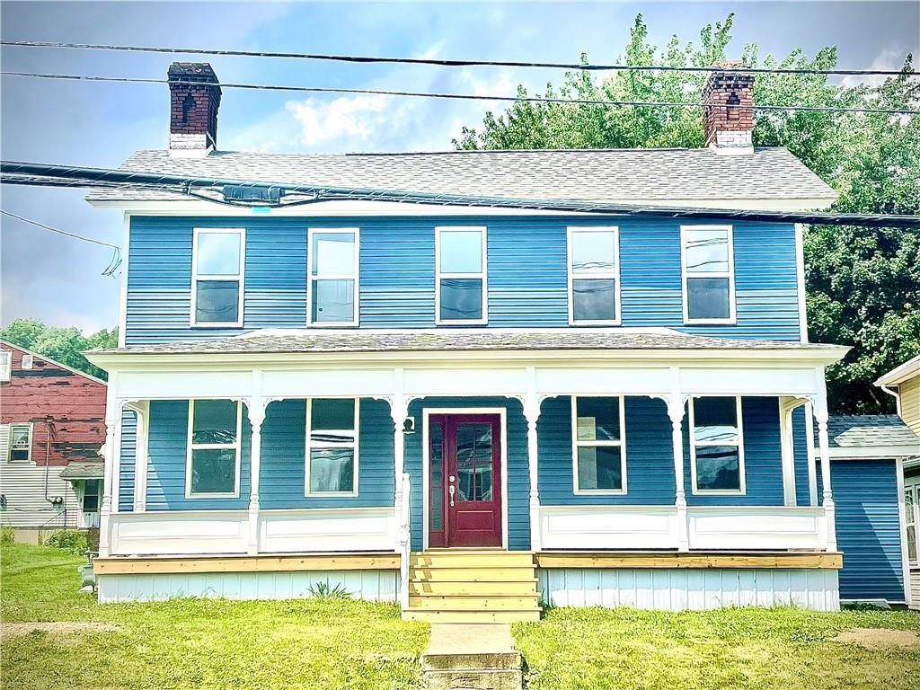 725 West Main Street Rural Valley, PA 16249 - Photo 6 of 35 a view of a house with a swimming pool